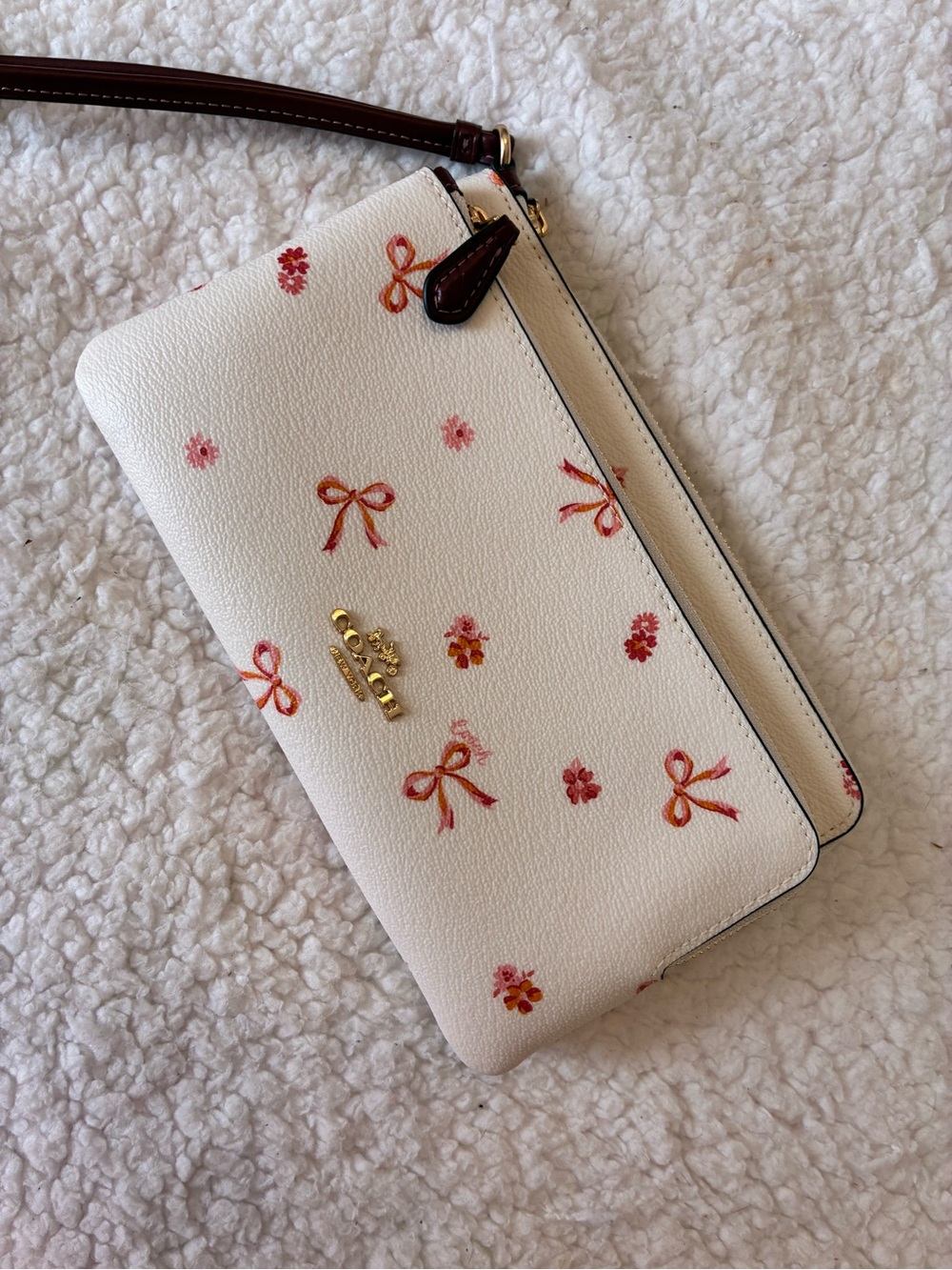 Coach Cream Wristlet with Pink Bow Print